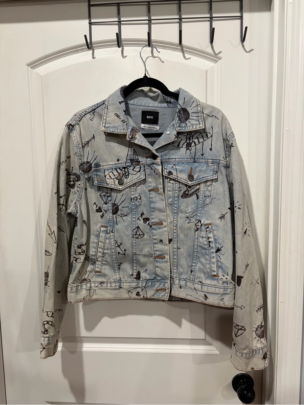 BDG Light Blue Denim Jacket with Black Graphic Sketches, NWT with a small stain